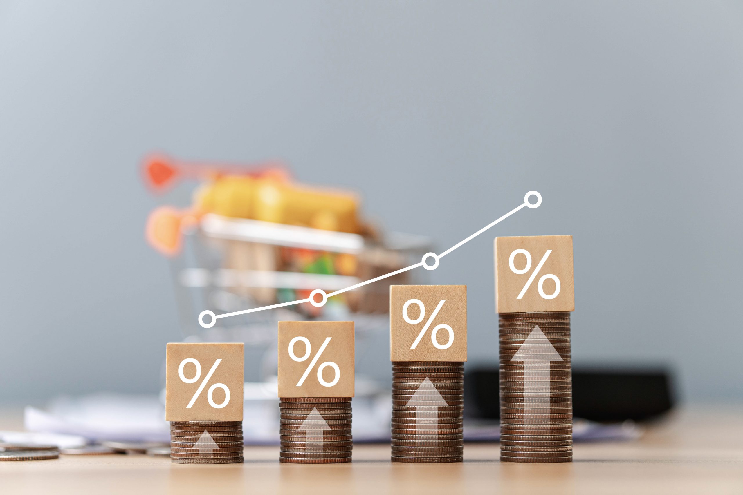 interest,on,stack,of,coins,stacked,on,table,with,percentage